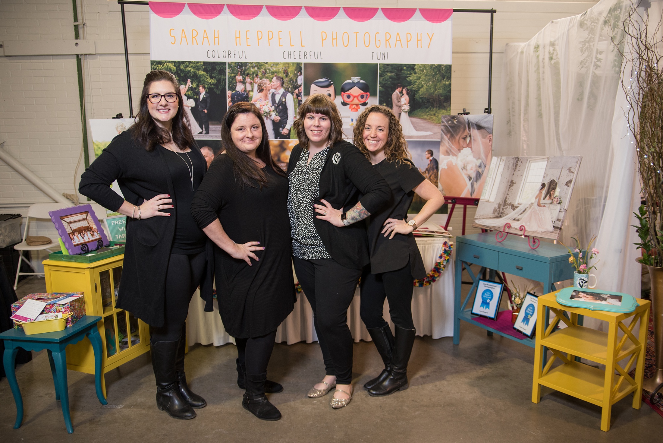 sarah heppell and her helpers at the bridal show in syracuse, ny