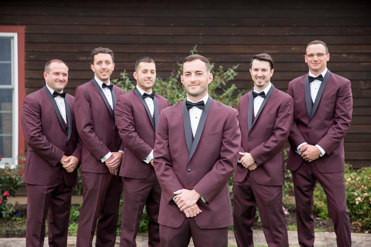 chantelle marie lakehouse and celebration venue, sarah heppell photography, groom with groomsmen in maroon suits and black ties, giovanni's formal, giovanni's formal maroon suits, groomsmen in suits from giovanni's formal