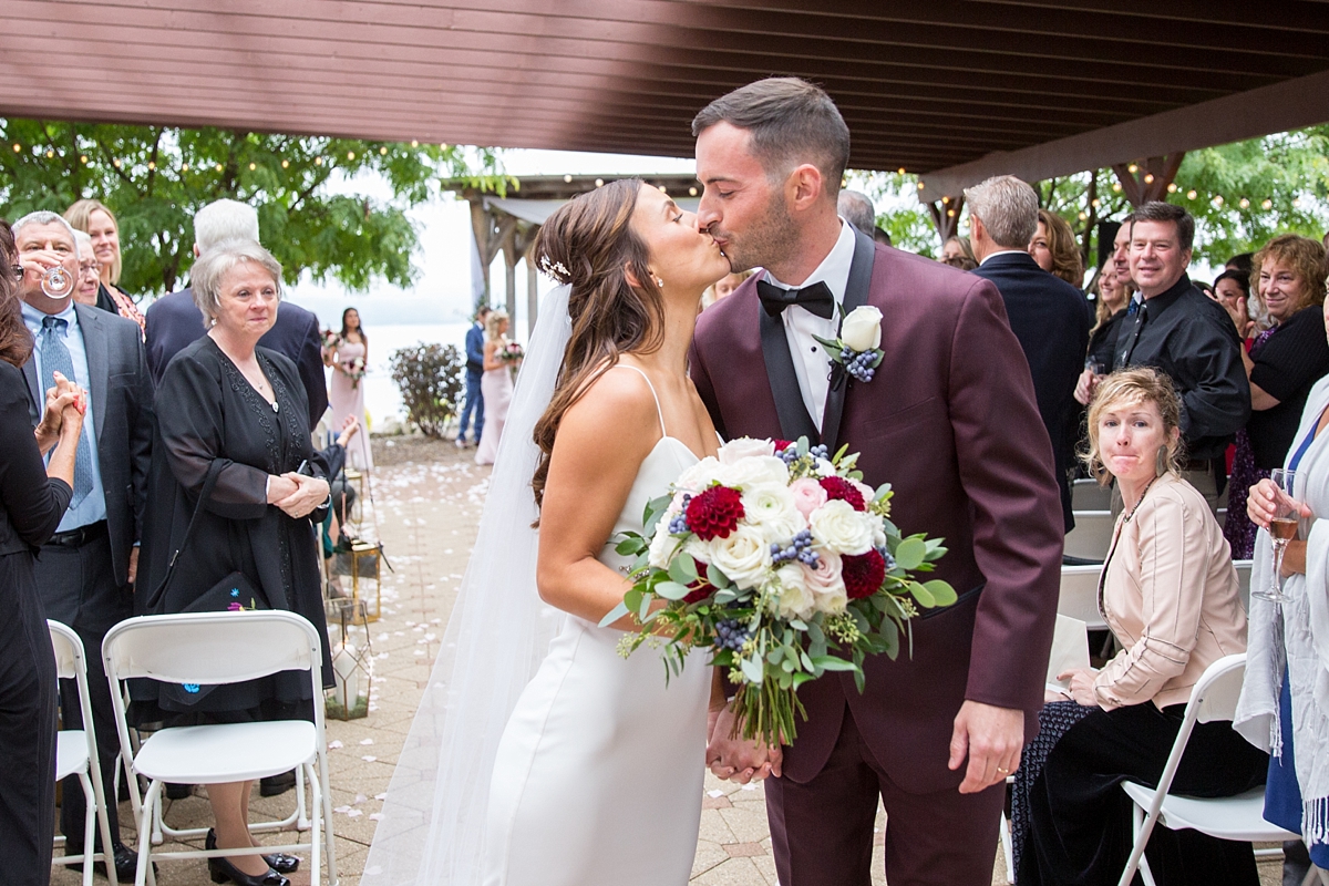 bride and groom kiss as husband and wife, chantelle marie lakehouse and celebration venue, sarah heppell photography