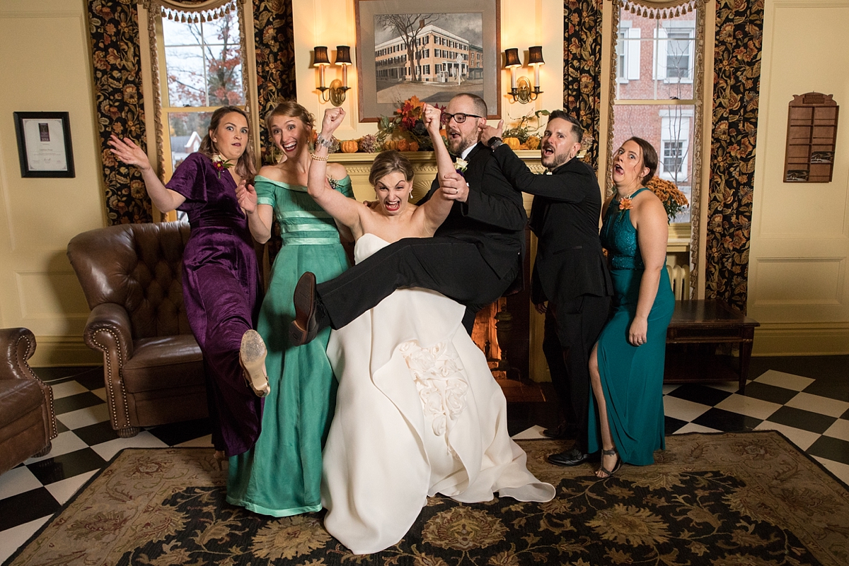 bride and groom get goofy with siblings at the lincklaen house in cazenovia, ny, sarah heppell photography