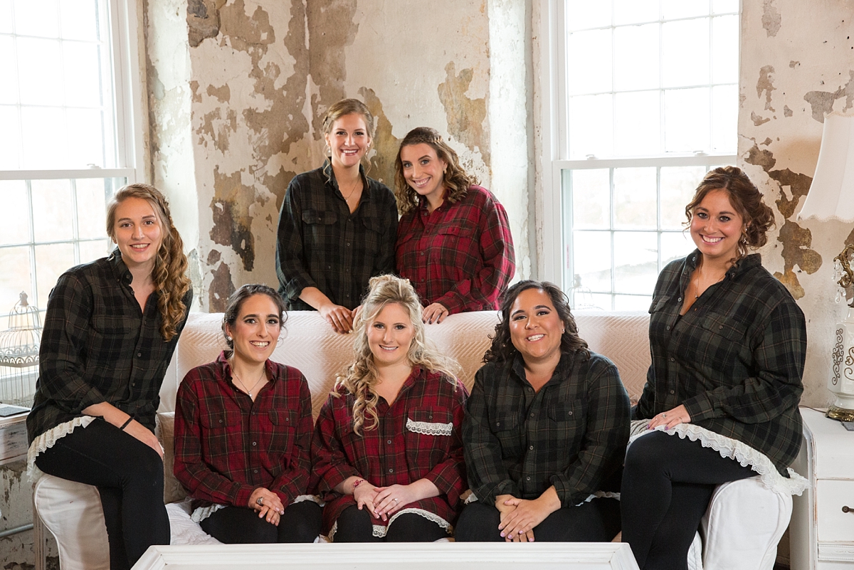 bride and bridesmaids in coordinating plaid shirts in the sinclair of skaneateles