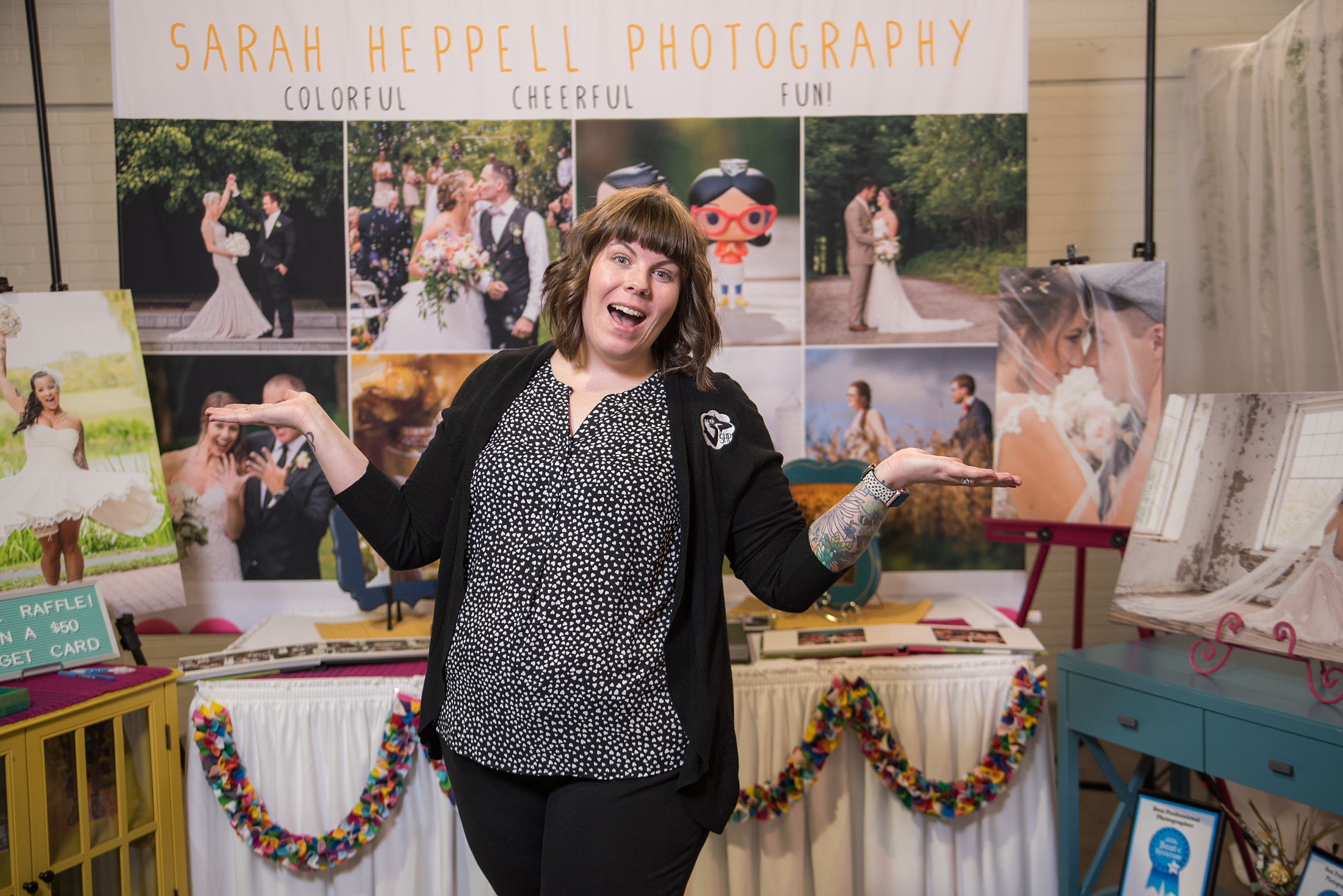 sarah heppell at her bridal show booth, syracuse ny bridal show, sarah heppell photography, wedding photographer